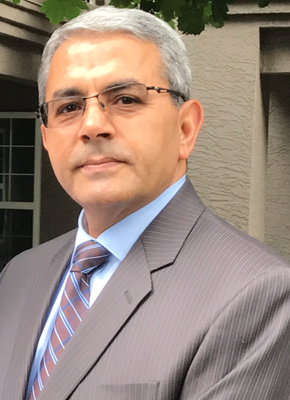 Portrait of Jamal Al-Ghabari, Associate.